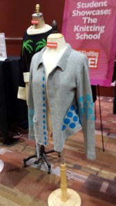 Sweater designs displayed at entrance t Vogue Knitting Live