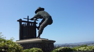 Wine crusher statue greets visitors to Napa Valley