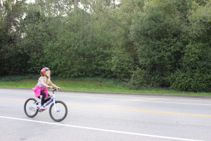 Youngster learning to ride a bike