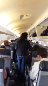 Sorry for the blur. There is little headroom for your average United passenger and even less leg room.
