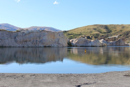 You can swim and picnic by St Bathans' Blue Lake.