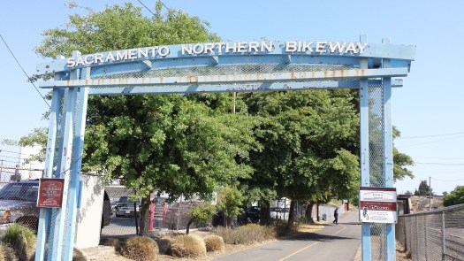 The entrance to the bike trail is just behind Blue Diamond Almond factory on C Street.