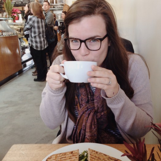 Coffee and breakfast egg sandwiches.